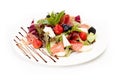 Sliced meat with lettuce leaves, strawberry, blackberry and cheese