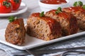 Sliced meat loaf with ketchup and parsley close-up Royalty Free Stock Photo