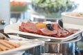 Sliced meats served on a tray at a buffet Royalty Free Stock Photo