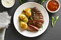 Sliced medium rare roast beef with potato Royalty Free Stock Photo