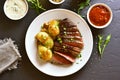 Sliced medium rare roast beef with potato Royalty Free Stock Photo