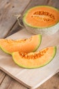 Sliced of melon on wood board. Royalty Free Stock Photo