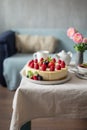 Sliced No Bake Strawberry Cheesecake Decorated with Fresh Berries and Mint Royalty Free Stock Photo