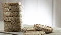 Sliced Oatmeal Bread on Wooden Table close-up