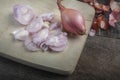 Sliced onions on cutting desk Royalty Free Stock Photo