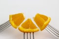 Sliced orange fork on white background. juicy orange slices