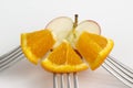 Sliced orange fork on white background. juicy orange slices