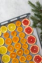 Sliced citrus on baking sheet Royalty Free Stock Photo