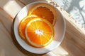 Sliced oranges on a white plate Royalty Free Stock Photo