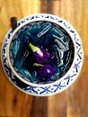 Sliced Palmyra Fruit in butterfly pea flower syrup Royalty Free Stock Photo