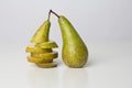 Sliced pear and whole pear Royalty Free Stock Photo