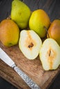 Sliced pears of varying degrees of ripeness