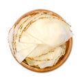 Sliced pepper cheese, fine sliced soft cheese tranches in wooden bowl