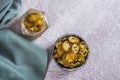 Sliced pickled jalapeno peppers in bowl and glass jar on table top view Royalty Free Stock Photo