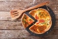 Sliced pie with cream cheese, tomatoes and herbs closeup. horizontal top view Royalty Free Stock Photo