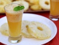 Sliced pineapple with juice Royalty Free Stock Photo
