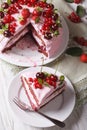 Sliced pink cake with fresh berries close up. vertical top view Royalty Free Stock Photo