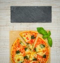 Sliced Pizza with Dark Plate as Copy Space Area