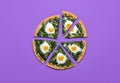 Sliced pizza with spinach and eggs, top view. Vegetarian pizza slices, minimalist