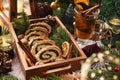 Sliced poppy seed roll in wooden box in rustic style and fruit compote for Christmas Royalty Free Stock Photo