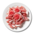 Sliced prosciutto crudo (raw ham) arranged in the shape of roses on white background with clipping path Royalty Free Stock Photo