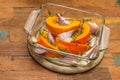 Sliced pumpkin with red onion, garlic and thyme Royalty Free Stock Photo