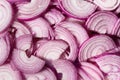 Sliced purple onions. Spanish red onion slices. Horizontal slicing. Background Royalty Free Stock Photo