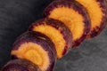 Sliced purple-orange carrots on the table Royalty Free Stock Photo