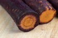 Sliced purple-orange carrots on the table Royalty Free Stock Photo