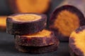 Sliced purple-orange carrots on the table Royalty Free Stock Photo