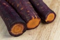 Sliced purple-orange carrots on the table Royalty Free Stock Photo