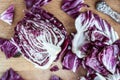 Sliced radicchio on wooden table. Selective focus. Close-up Royalty Free Stock Photo