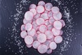 Sliced radish on the black slate board, Royalty Free Stock Photo