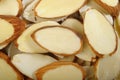 Sliced raw almonds background Royalty Free Stock Photo