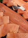 Sliced raw salmon or fresh salmon. Salmon fillets for sale at market displayed with a patchwork effect. Many fresh salmon fish Royalty Free Stock Photo