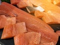 Sliced raw salmon or fresh salmon. Salmon fillets for sale at market displayed with a patchwork effect. Many fresh salmon fish Royalty Free Stock Photo