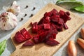 Sliced red beets with garlic, onion, bay leaf and allspice - preparation of beet kvass Royalty Free Stock Photo