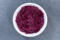 Sliced red cabbage from above bowl on a slate Royalty Free Stock Photo