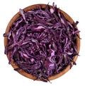 Sliced red cabbage in a wooden bowl on a white Royalty Free Stock Photo