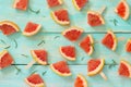 Sliced red grapefruit ice cream with rosemary on the background of old wooden. Royalty Free Stock Photo