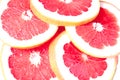 Sliced red grapefruit isolated on white background cut into five rings Royalty Free Stock Photo