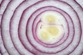 Sliced red onion close up. Backgrounds of vegetables. Royalty Free Stock Photo