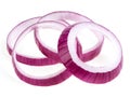 Sliced red onion rings isolated on white background. Violet onion slices Royalty Free Stock Photo