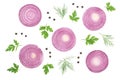 Sliced red onion rings with parsley leaves and peppercorns isolated on white background. Top view. Flat lay pattern Royalty Free Stock Photo