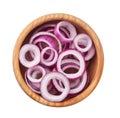 Sliced red onion in a wooden bowl isolated on white background, top view Royalty Free Stock Photo