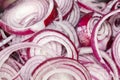 Sliced red onions closeup. Background image Royalty Free Stock Photo