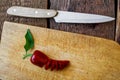 Sliced red pepper on a wooden cutting board Royalty Free Stock Photo