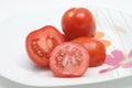 Sliced red tomatoes on a plate Royalty Free Stock Photo