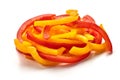 Sliced red and yellow bell pepper, close-up, isolated on white background. Royalty Free Stock Photo