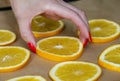 Sliced rings of fresh juicy orange for drying Royalty Free Stock Photo